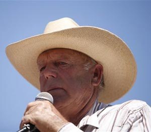In this April 24, 2014, file photo, rancher Cliven Bundy speaks at a news conference near Bunkerville, Nev.