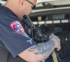 A too-big dot may cover your target while a ring may be harder to center. (Photo/PoliceOne)
