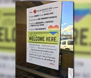 Chief Brian Schaeffer was heavily criticized for posting a sign stating “All are welcome here” on the front door of every fire station in the city.