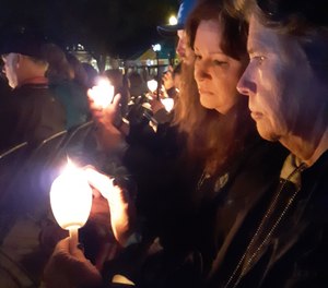 Sisters Starr Sidelinker and Rhoda Hembd have been to 13 Police Week services to honor the memory of their brother, Harley Alfred Chisholm, who was ambushed and murdered along with two fellow officers in 2004.