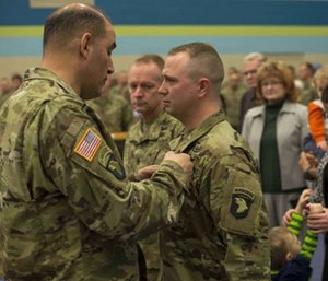 Staff Sgt. Nicholas Davis finished rescuing Rick and Sharon Steiert from a burning vehicle despite catching on fire himself.