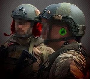 Over-the-ear headsets like the one on the left can be cumbersome, while the CLARUS XPR (on the right) is a lightweight option that doesn't compromise an officer's situational awareness. (photo/Silynx)