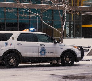 A snow-covered Denver Police cruiser. (Photo/Braden Chilton)