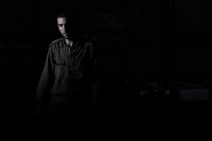 Man with PTSD walking out of the shadows (Photo/Wikimedia)