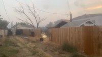 Video: Fallen powerline sparks in Wyo. firefighter's hands