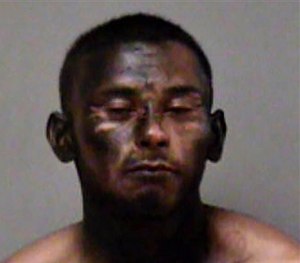 This booking photo released by the Madera Police Department, shows 23-year-old Jose Espinoza, who was arrested Saturday night, March 14, 2015. (AP Image)
