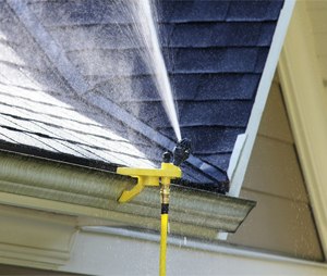 One of the smartest ways to help protect your home is to keep the roof and surrounding area wet. (Photo courtesy WASPwildfire.com)
