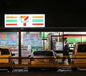 Police work the scene of a stabbing in Santa Ana, Calif., Wednesday, Aug. 7, 2019. (AP Photo/Alex Gallardo)