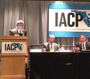 At the podium, Captain Paul O’Keefe of Aurora, Colo., is joined by Chief Michael Kehoe of Newtown, Conn., and Chief Ronnie Bastin of Lexington, Ky. during a session at IACP.