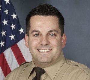 An undated photo provided by the St. Louis County Police Department shows St. Louis County Police officer Blake Snyder. (St. Louis County Police Department via AP)