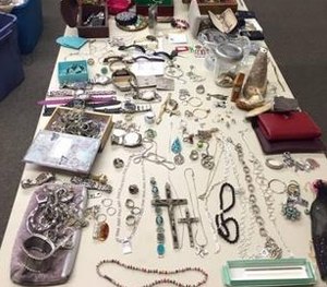 A search of a hotel room uncovered more than 300 stolen items. (Lakeville Police Image)