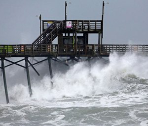Hurricane Florence lumbered ashore in North Carolina with howling 90 mph winds and terrifying storm surge. (Photo/AP)