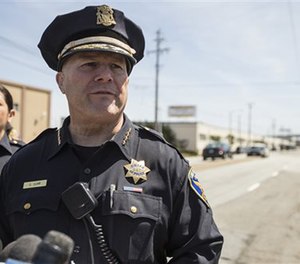 SFPD Chief Greg Suhr briefs the media near the scene where a 27-year-old woman was shot and killed by police in the Bayview District of San Francisco, Thursday, May 19, 2016.