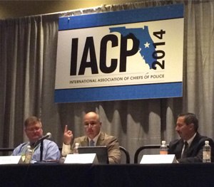 Swansea (Ma.) Police Chief George Arruda (center) discusses a hacking incident his department faced at IACP 2014.