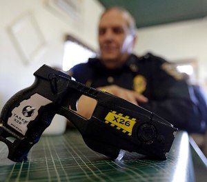 In this Nov. 14, 2013 photo, a Taser X26 is shown.