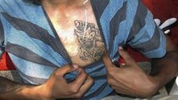 Street gangs tone down use of colors, tattoos