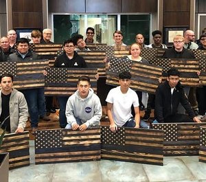 Junior and senior students at Waxahachie High School made and delivered 98 Thin Blue Line flags to local police officers. (Photo/WPD)