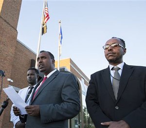 Abdulwahid Osman, the lawyer for the family of Dahir Ahmed Adan, speaks during a news conference at St. Cloud City Hall in St. Cloud, Minn., Monday, Sept. 19, 2016.