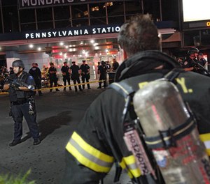 A firefighters enters Pennsylvania Station during an emergency preparedness drill conducted by the NYC Office of Emergency Management (OEM), Sunday, Aug. 26, 2007, in New York. The multi-agency drill tested the effectiveness of emergency operations plans when responding to a terrorist incident within a train station.