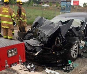 The Tesla Model S crashed into the truck at 60 mph apparently without braking before impact, according to police. (Photo/AP)