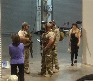 Members of the Garland Police Department stand inside the Curtis Culwell Center, Sunday, May 3, 2015, in Garland, Texas.
