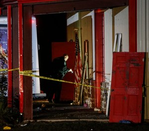 Authorities work the scene after a deadly shooting in Greenville, Texas, on Sunday, Oct. 27, 2019. (Ryan Michalesko/The Dallas Morning News via AP)