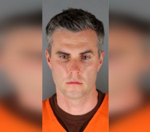 Former Minneapolis police officer Thomas Lane is charged with aiding and abetting second-degree murder in George Floyd's death.