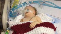 Toddler on life support after choking on popcorn 