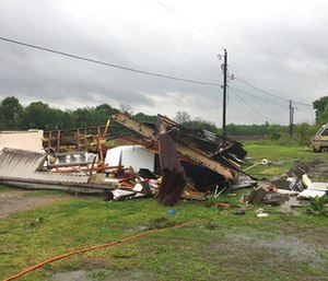 The remains of a trailer lie where a woman and her 3-year-old daughter were killed during a severe storm. (Maj. Ginny Higgins/St. Martin Parish Sheriff's Office via AP)