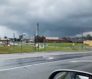 A sheriff confirmed at least 14 people were killed by a possible tornado in Alabama on Sunday as severe storms destroyed mobile homes, snapped trees and left a trial of destruction. (Photo/AP)