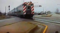 Video: Ill. LEO swerves off road to avoid being hit by train