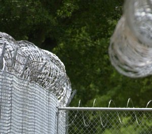 Barb wire fences surround the North Carolina Correctional Institution for Women. (File photo/Raleigh News & Observer/TNS)