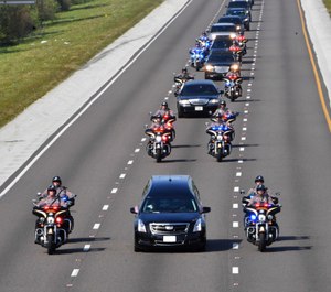 The funeral procession for Florida Highway Patrol Trooper Joseph Bullock proceeds on I-75 south-bound enroute to the Sarasota National Cemetery on Thursday, Feb. 13. (Photo/AP)