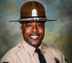 This undated photo provided by the Illinois State Police shows retired Illinois State Police Trooper Gregory Rieves. (Illinois State Police via AP)