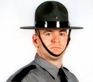 In this undated photo released by the Pennsylvania State Police, Cpl. Seth J. Kelly, is shown. (Pennsylvania State Police via AP Photo)