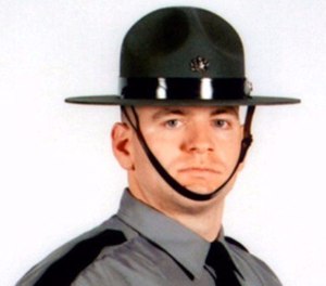 In this undated photo released by the Pennsylvania State Police, Cpl. Seth J. Kelly, is shown. (Pennsylvania State Police via AP Photo)