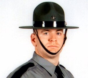 In this undated photo released by the Pennsylvania State Police, Cpl. Seth J. Kelly, is shown. (Pennsylvania State Police via AP Photo)