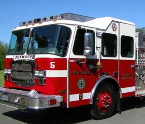 Quick action by Plymouth Fire Department firefighters likely saved their station after an engine caught fire in its bay. (Photo/PFD)