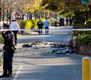 Bicycles and debris lay on a bike path after a motorist drove onto the path near the World Trade Center memorial, striking and killing several people Tuesday, Oct. 31, 2017, in New York.
