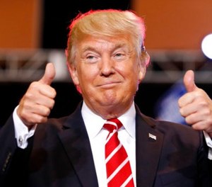 In this Aug. 22, 2017, file photo, President Donald Trump reacts before speaking at a rally at the Phoenix Convention Center in Phoenix.
