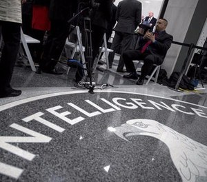 In this Jan. 21, 2017, file photo, President Donald Trump, background, speaks at the Central Intelligence Agency in Langley, Va. Trump’s unpredictable foreign policy could hamper long-standing U.S. intelligence-sharing partnerships as countries react to a president who seeks closer ties to Russia and is unafraid to offend American allies by cracking down on immigration or getting angry with friendly leaders.