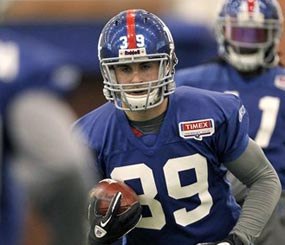 New York Giants defensive back Tyler Sash runs with the ball during NFL football practice, Thursday, Jan. 12, 2012, in East Rutherford, N.J. (AP Image)