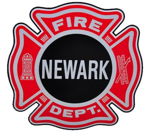 Newark firefighters rescued several trapped residents during an apartment blaze on Thursday morning. One child was hospitalized for smoke inhalation.