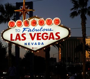 In this Sept. 21, 2018, file photo, the Mandalay Bay hotel and casino reflects the last sunlight of the day along the Las Vegas Strip in Nevada.