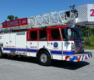 The aerial truck is a 2016 E-One Cyclone II Extreme Duty cab and chassis with a 95-foot rear mount tower ladder.