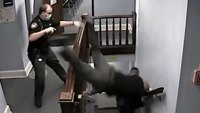 Video review: Officer dives down courthouse stairs to prevent suspect's escape