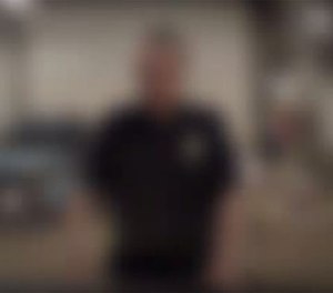 A still photo of a heavily redacted body-worn camera video released by the Seattle Police Department.