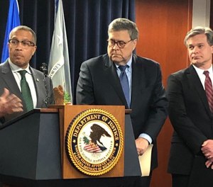 Detroit Police Chief James Craig,left, speaks as U.S. Attorney General William Barr, and FBI Director Christopher Wray listen during the announcement of a new national crime reduction initiative.