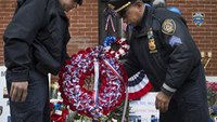 Thousands attend wake for slain NYC officer 