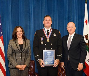 Governor Brown and Attorney General Harris with San Diego Fire-Rescue Department Firefighter Alexander Wallbret. (Photo/California Governor’s Office)